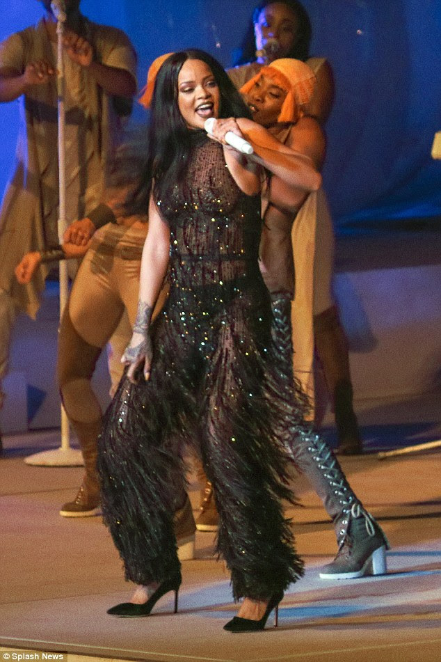 Glam number: Rihanna looked incredible in her sparkly feathered number