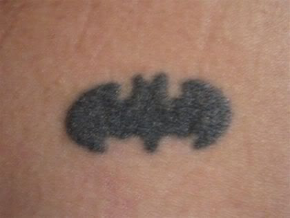 It's a small about the width of a silver dollar rendition of the Batman It's a small about the width of a silver dollar rendition of the Batman
