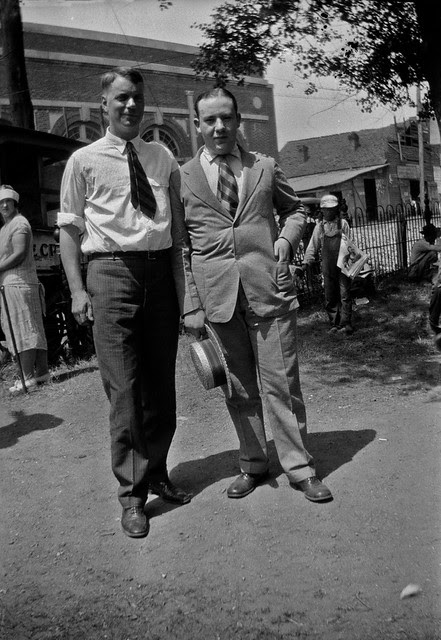 College student William Silverman (at right), standing with his former high school teacher, on the lawn of the Rhea County Courthouse, Dayton, Tennessee, July 1925.