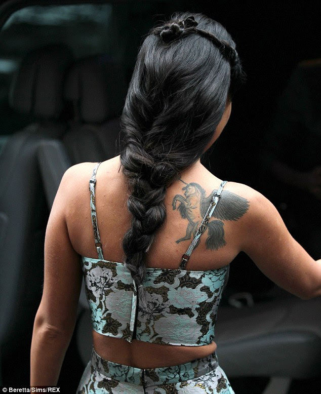Tattoo'll do nicely: The singer was clearly keen to show off her tattoo of a unicorn
