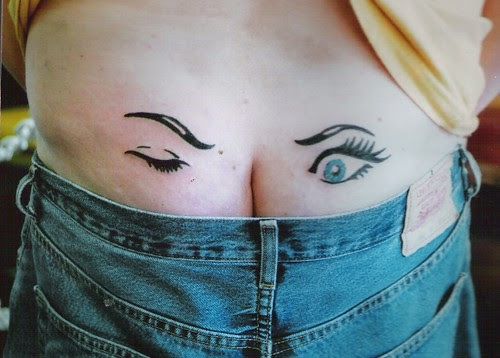 eyes on me arse tattoo. funny tattoo by dublin ireland tattoo artist 'Pluto'