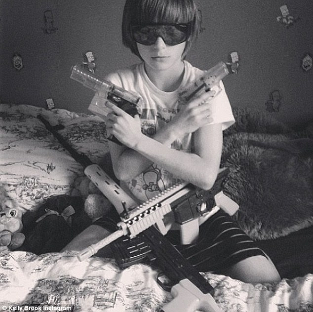 Family time: She wrote 'Became a Godmother to Brando!!' alongside this picture
