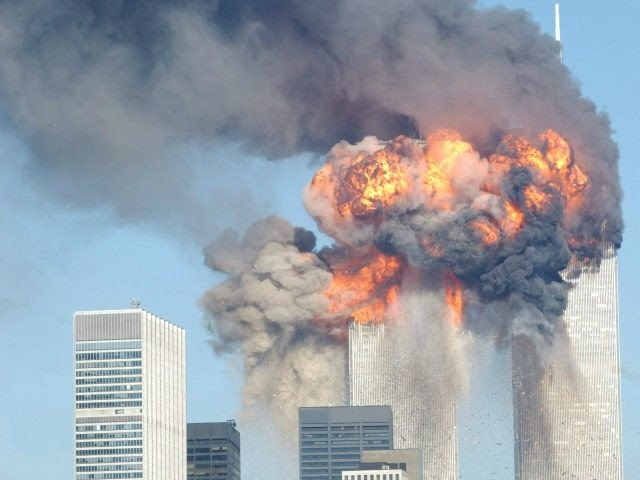 A fiery blasts rocks the World Trade Center after being hit by two planes September 11, 2001 in New York City.