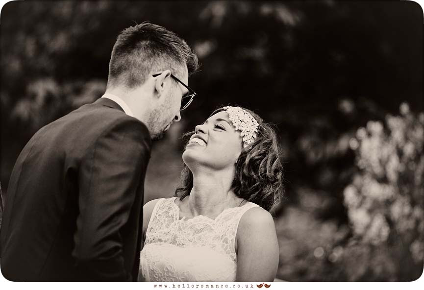 Groom trying to kiss bride