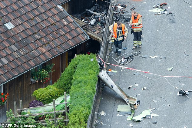Tragedy: The 50-year-old pilot was inside his plane when it crashed into a barn in Dittingen in  Switzerland