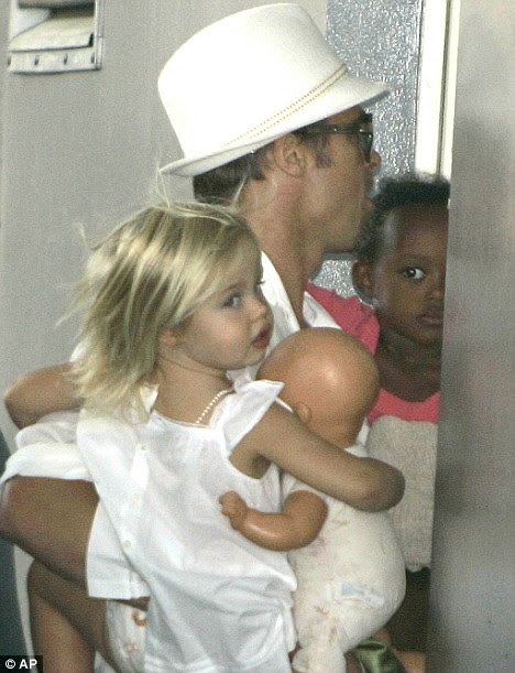 Angelina Jolie Pregnant Shiloh. Brad Pitt carrying Shiloh and