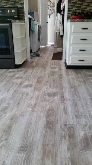 While vinyl and laminate might look alike in some circumstances, they have their pros and cons. Lifeproof Lighthouse Oak 8.7 in. W x 47.6 in. L Luxury