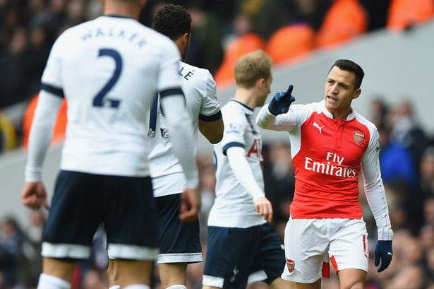 Alexis Sanchez reacts towards Mousa Dembele