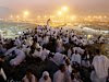 Muslim pilgrims pray on a rocky hill called the Mountain of Mercy, on the Plain of Arafat near the holy city of Mecca, Saudi Arabia, in the early hours of Thursday, Oct. 25, 2012. Saudi authorities say around 3.4 million pilgrims — some 1.7 million of them from abroad — have arrived in the holy cities of Mecca and Medina for this year's pilgrimage. (AP Photo/Hassan Ammar)