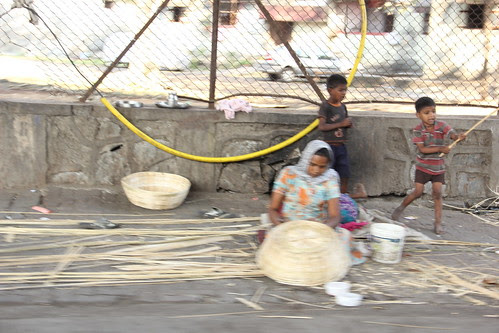 weaving a tale of survival through the meshes of a basket by firoze shakir photographerno1