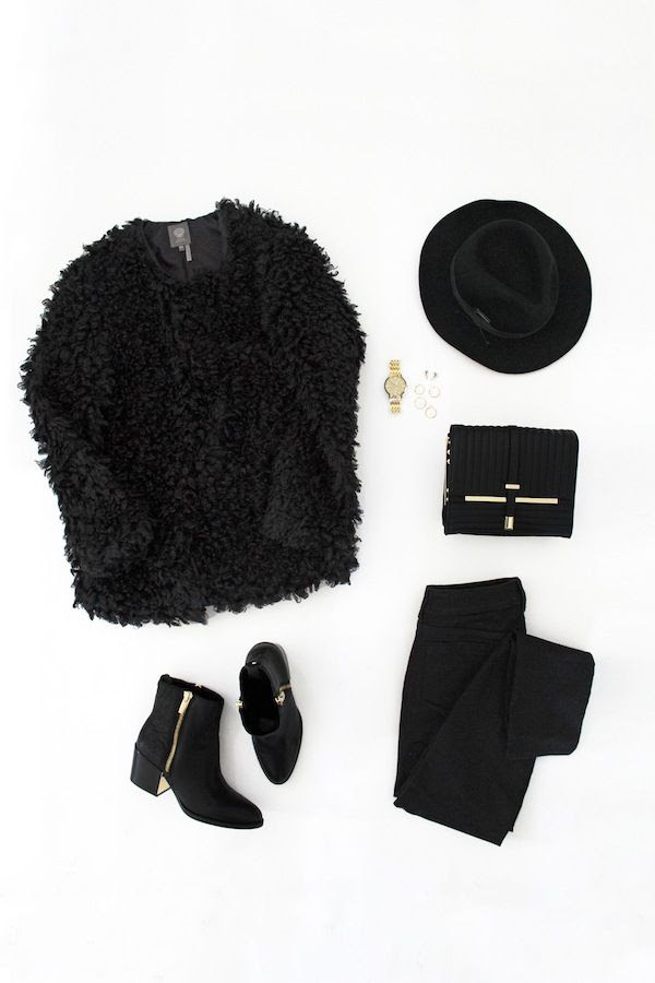 Le Fashion Blog All Black Budget Friendly Winter Style Black Faux Fur Coat Hat Gold Watch Quilted Bag Black Jeans Metal Heel Ankle Boots Vince Camuto Macys
