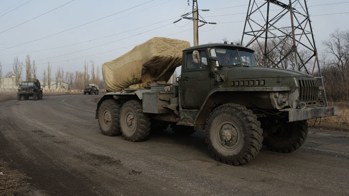 BM-21 Grad multiple rocket launcher systems are withdrawn from Donetsk towards Amvrosievka as part of Minsk Agreements implementation. (RIA Novosti/Mikhail Voskresenskiy)
