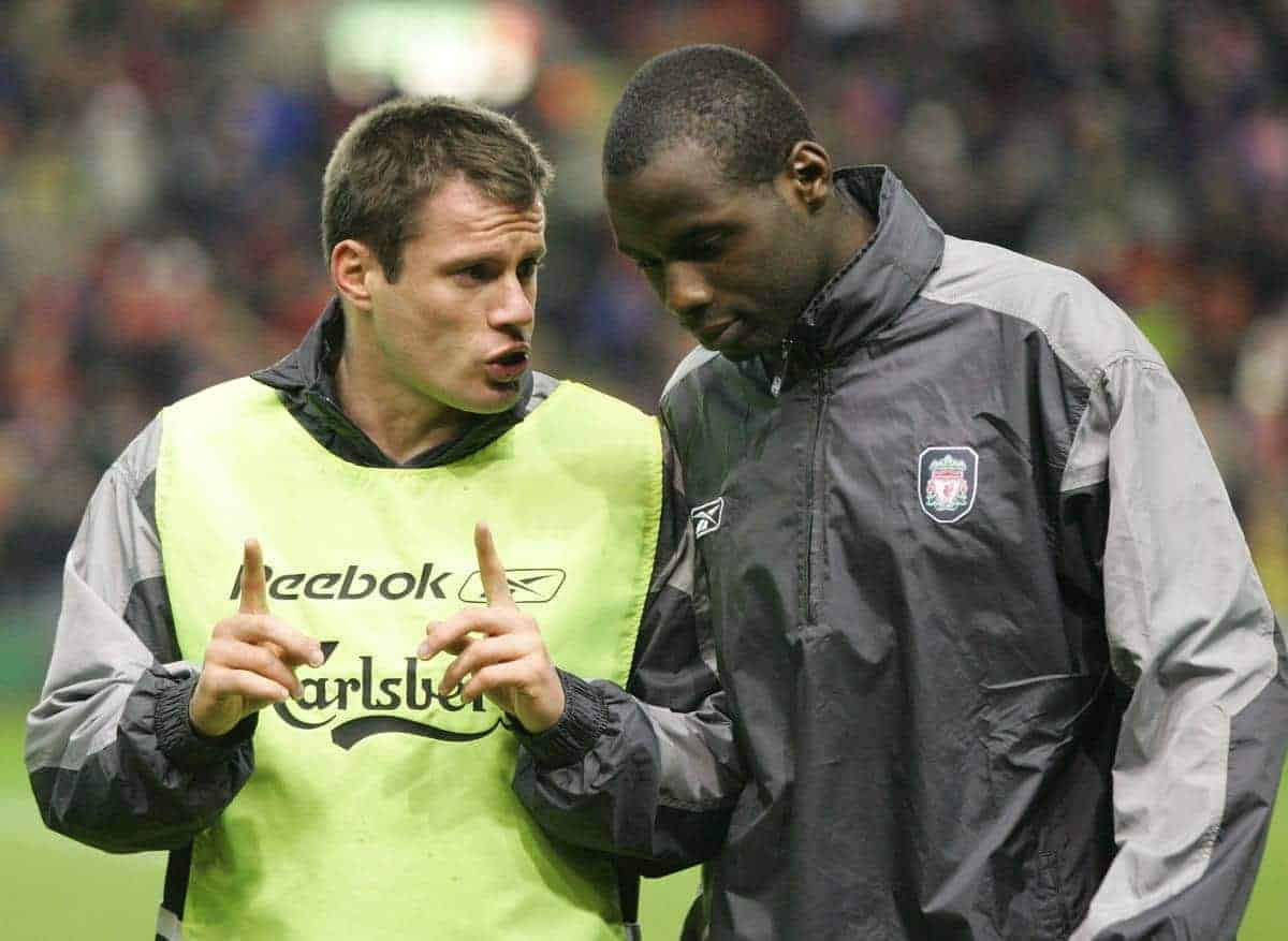 LIVERPOOL, ENGLAND - TUESDAY JANUARY 11th 2005: Liverpool's Jamie Carragher chats with team-mate Djimi Traore before the League Cup Semi-Final 1st Leg at Anfield. (Pic by David Rawcliffe/Propaganda)