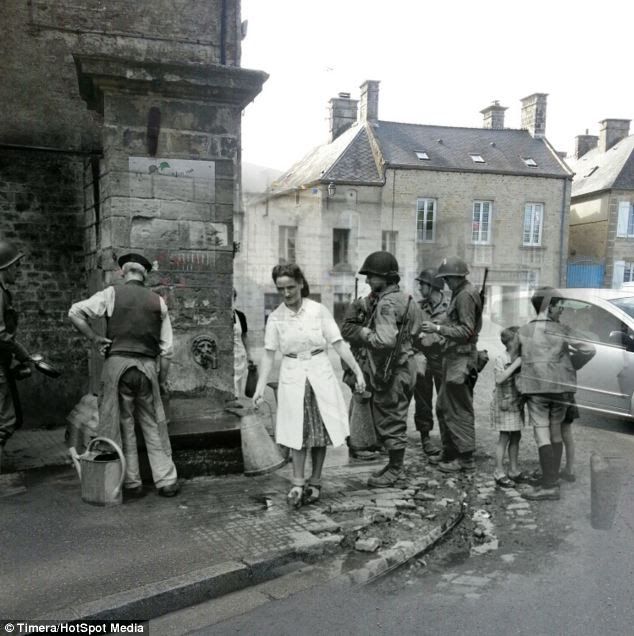 Soldiers and civilians in Normandy, France, in 1944, pictured on a background from today. The developer was inspired to make the app after reading about photographer Larenkov's work Link to the Past