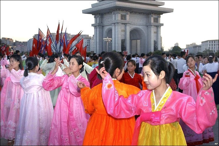 Young women sing and dance in North Korea