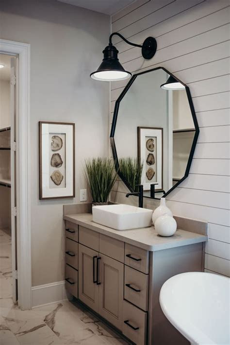Color, style, and cost are important factors to consider, but you also want a toilet that's comfortable. hexagonal-bathroom-mirror-ideas | HomeMydesign