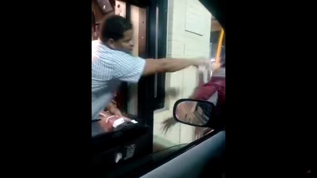 <span class='image-component__caption' itemprop="caption">Just when the man comes within reach, the unidentified employee is seen splashing a cup of water on him to the amusement of a recording customer.</span>