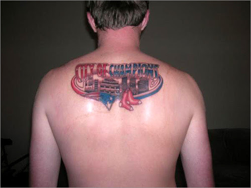 Mike Infusino of Scituate shows off his new Pats and Sox tattoo.