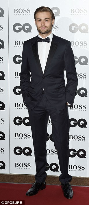 Back in town: Douglas Booth arrived back from Los Angeles to enjoy the show wearing a traditional tuxedo just like Burberry creative director Christopher Bailey and Samuel L. Jackson
