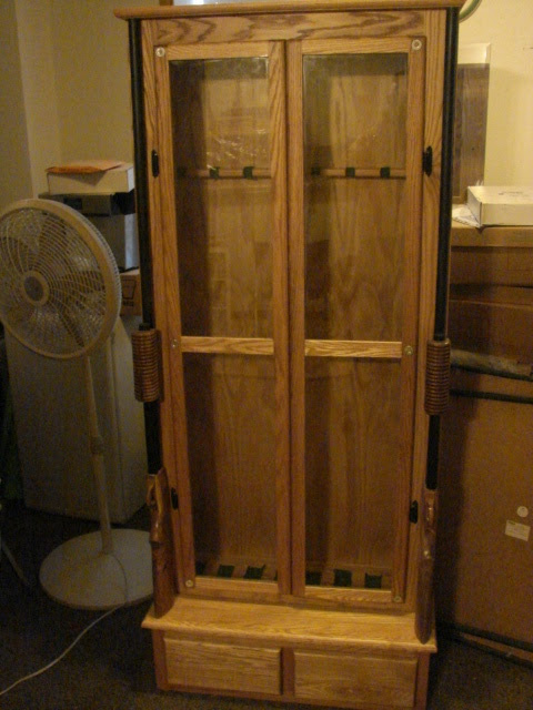 Custom Gun Cabinet with hand carved Guns | Building projects | Pinter 