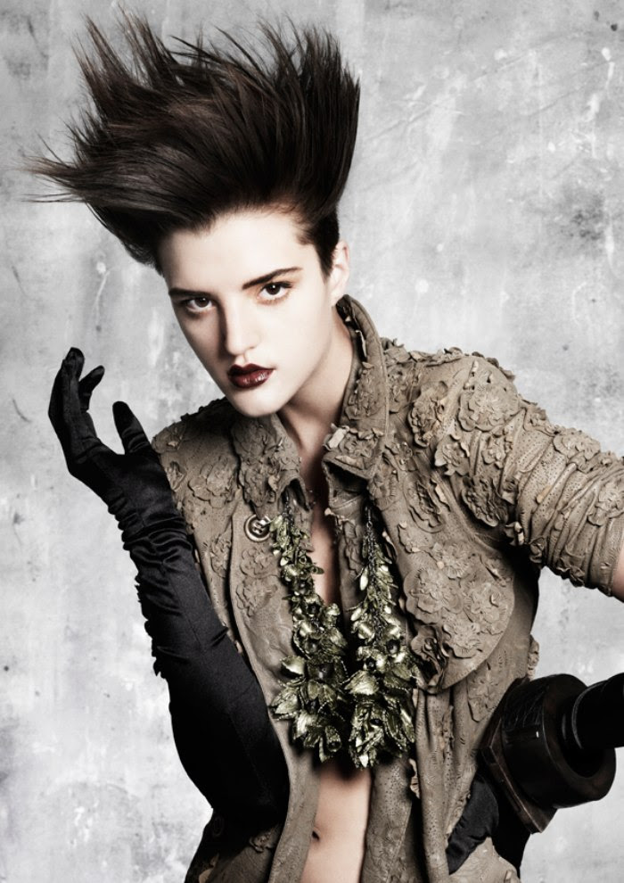 Hair styled straight up with the tips thinned for a modern ...