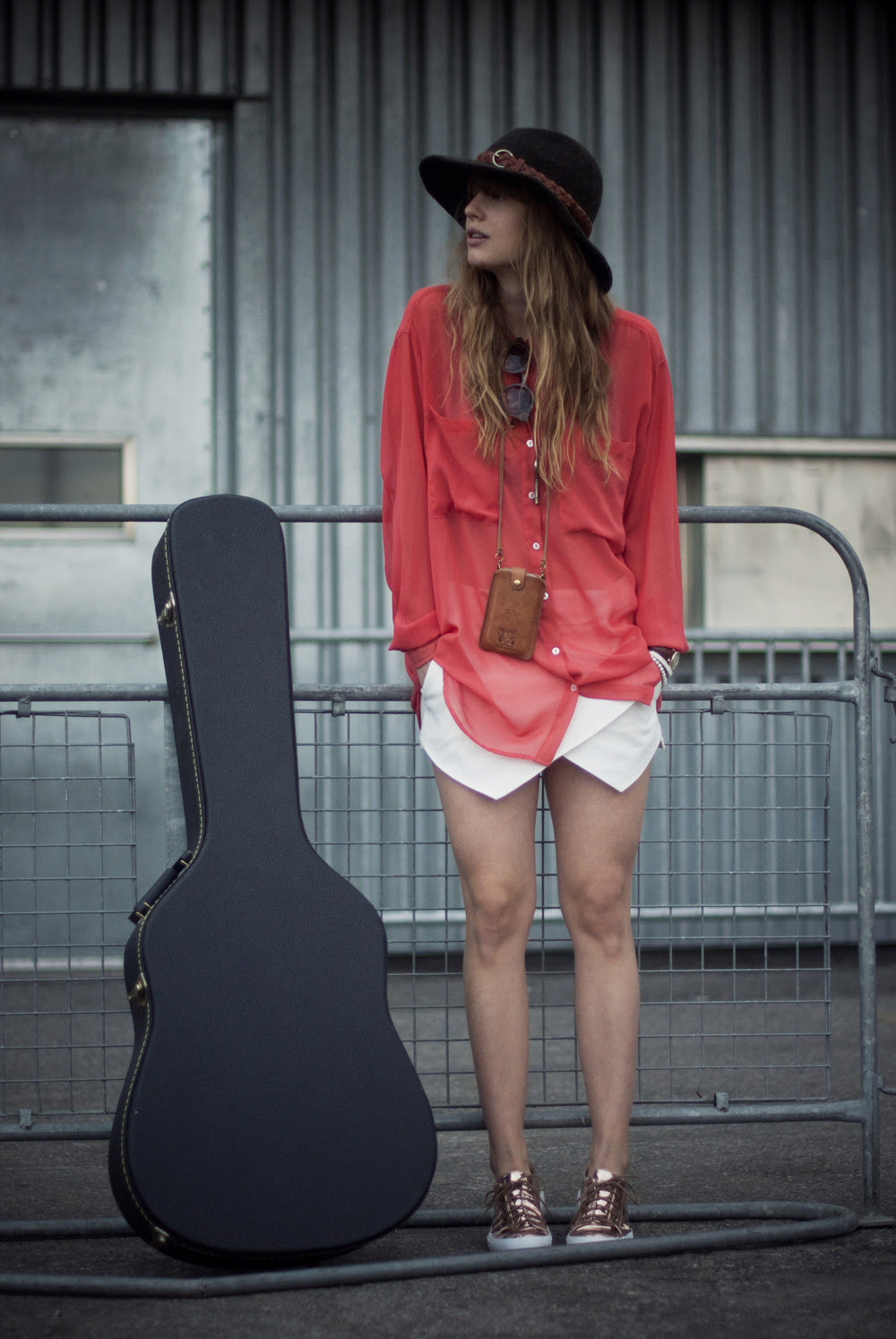 music to my ears

did a collaboration with ENVIshoes all about these lovely metallic sneakers a.k.a. the JC flavia - check out the blog post here plus read my interview!
by the way, i do actually play the guitar, not very well by an means, but i did teach myself so i will use that as an excuse. i like singing and strumming along when i&#8217;m feeling emotional. maybe one day you&#8217;ll see :) orrrrr more likely you won&#8217;t, cause i&#8217;m shy like that.
wearing: JC flavia sneakers via ENVIshoes // american apparel red blouse // zara skort // tevin vincent bracelets // urban outfitters watch, hat, and sunnies // nic&amp;mel iphone case // vintage necklace
photos by the awesome marcel @ onedapperstreet.com