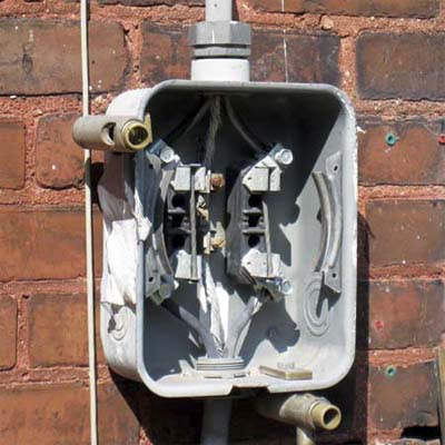 illegally wired bypass set up to bypass the home's electric meter < >
