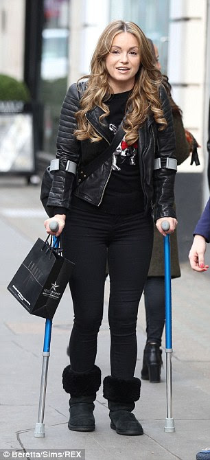 Dressed down: Ola was wearing a rock inspired look comprising a leather jacket and printed T-shirt