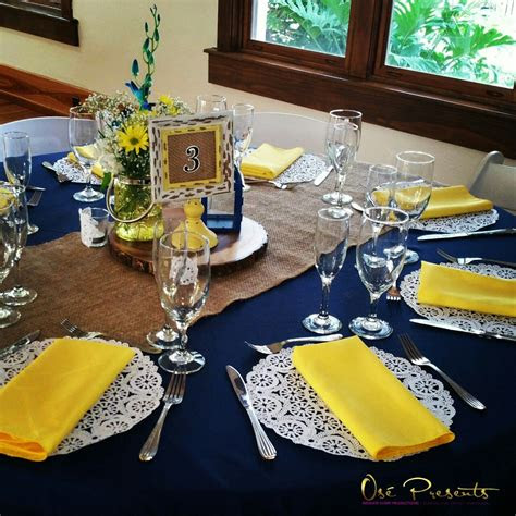 navy  yellow rustic themed wedding table decor event