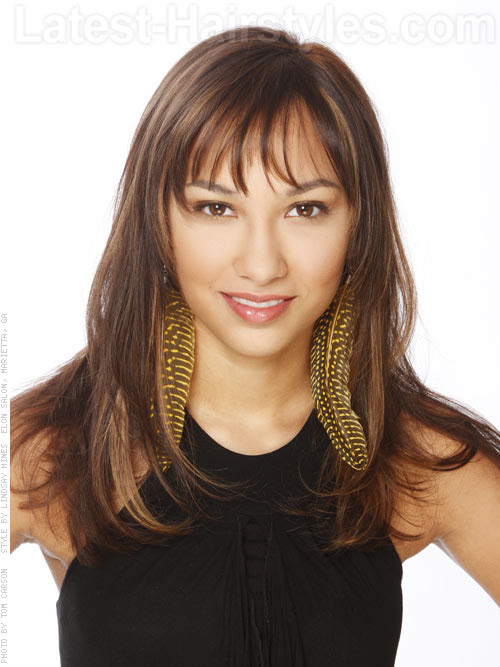 Long haircut with layers and wispy bangs