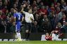Referee Phil Dowd shows Chelsea's Branislav Ivanovic the red card after his foul on Manchester United's Angel Di Maria 