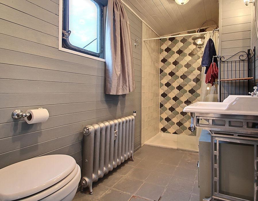 A tastefully decorated bathroom | Can you guess the secret ...