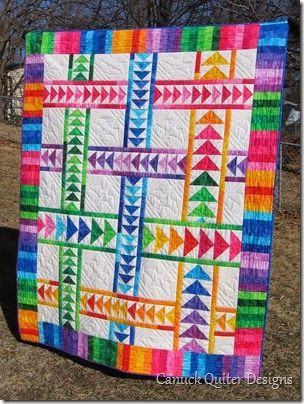 Really love Flying Geese quilts! I'd use more muted colors though. Maybe batiks!
