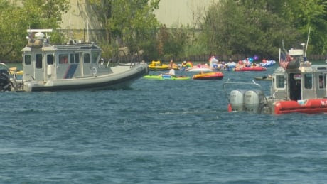 Boats out watching for floaters in danger during Port Huron Float Down