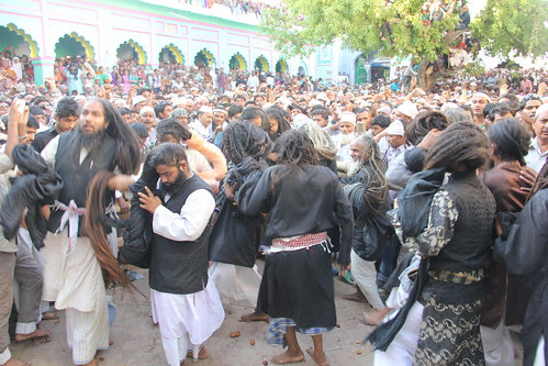 The Malangs Open Out Their Long Hair At The Holy Shrine of Zinda Shah Madar by firoze shakir photographerno1