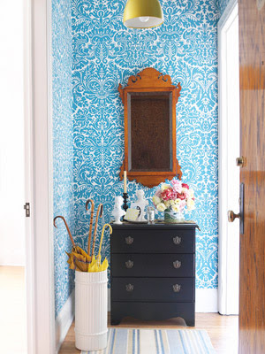 entryway with blue wallpaper