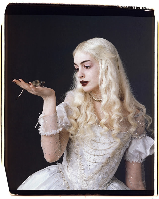 Check out all the elaborate and fantasy-driven designs of Anne Hathaway as 