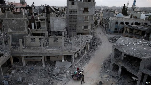 Damaged buildings in the northern Gaza Strip town of Beit Hanoun (18 August 2014)