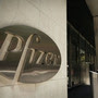 Pfizer is pursuing British drugmaker AstraZeneca, in part because it wants to lower its tax rate by moving its headquarters to London.