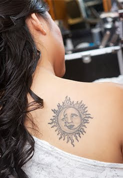 Tribal tattoo sun
