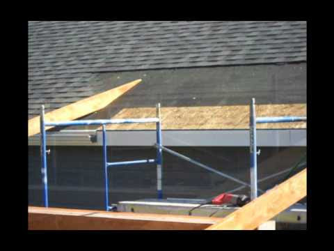 Construction of a roof addition over an existing concrete patio in 