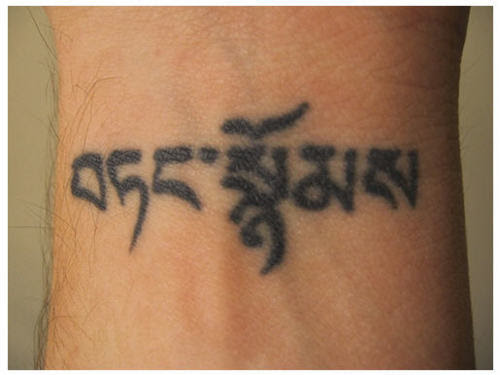Tibetan script that means “equanimity.” I wanted to get this tattooed on the 
