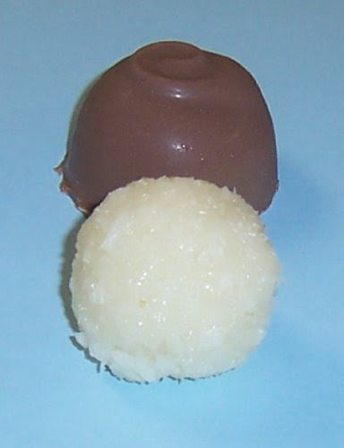 Scott's Cakes Milk Chocolate Coconut Cream Filling Candies with Yellow Green Foils in a 8 oz. Snowflake Box