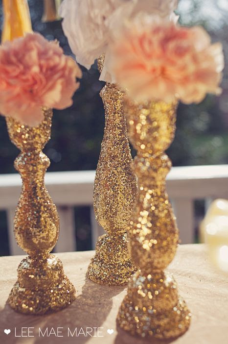 #DIY glittered candle sticks---buy cheap wooden candle sticks from the craft store and cover them in glitter