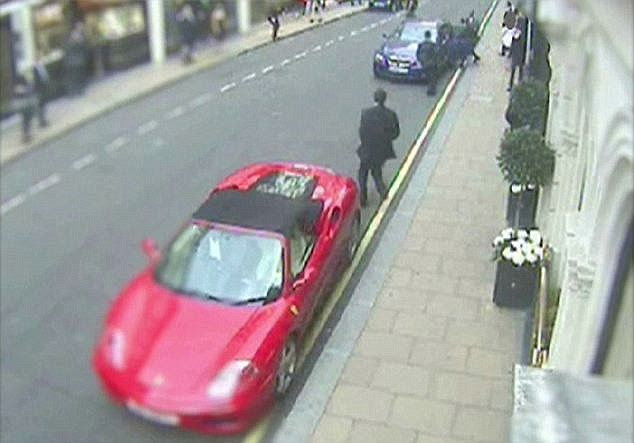 Escape: One of the gang escaped in a Ferrari but two were caught. Nebojsa Denic was stopped by a security guard outside and Milan Jovetic was arrested in France