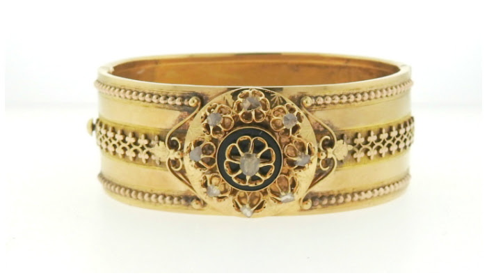 A Victorian gold and diamond bangle bracelet.