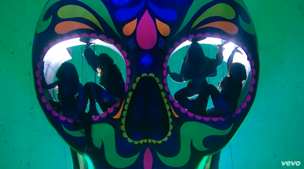 First, they appeared on stage in the eyes of a giant skull, because why the hell not?