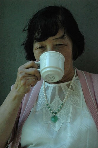 Artist Reiko enjoying tea at the Frye Art Museum, Seattle, Washington, USA by Wonderlane