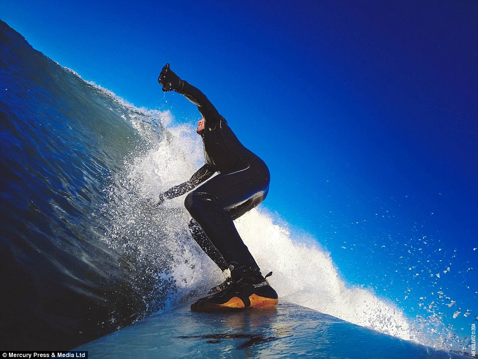 Regular fix: When at home in San Francisco, surfing his local breaks is Abe's usual means of getting the rush he craves