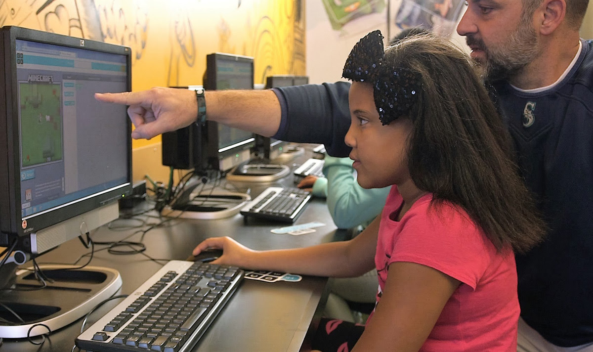 Kids using Microsoft's 'Minecraft' coding tutorial